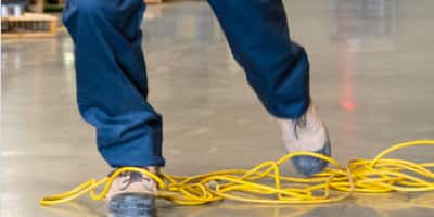 feet tangled in a yellow cord